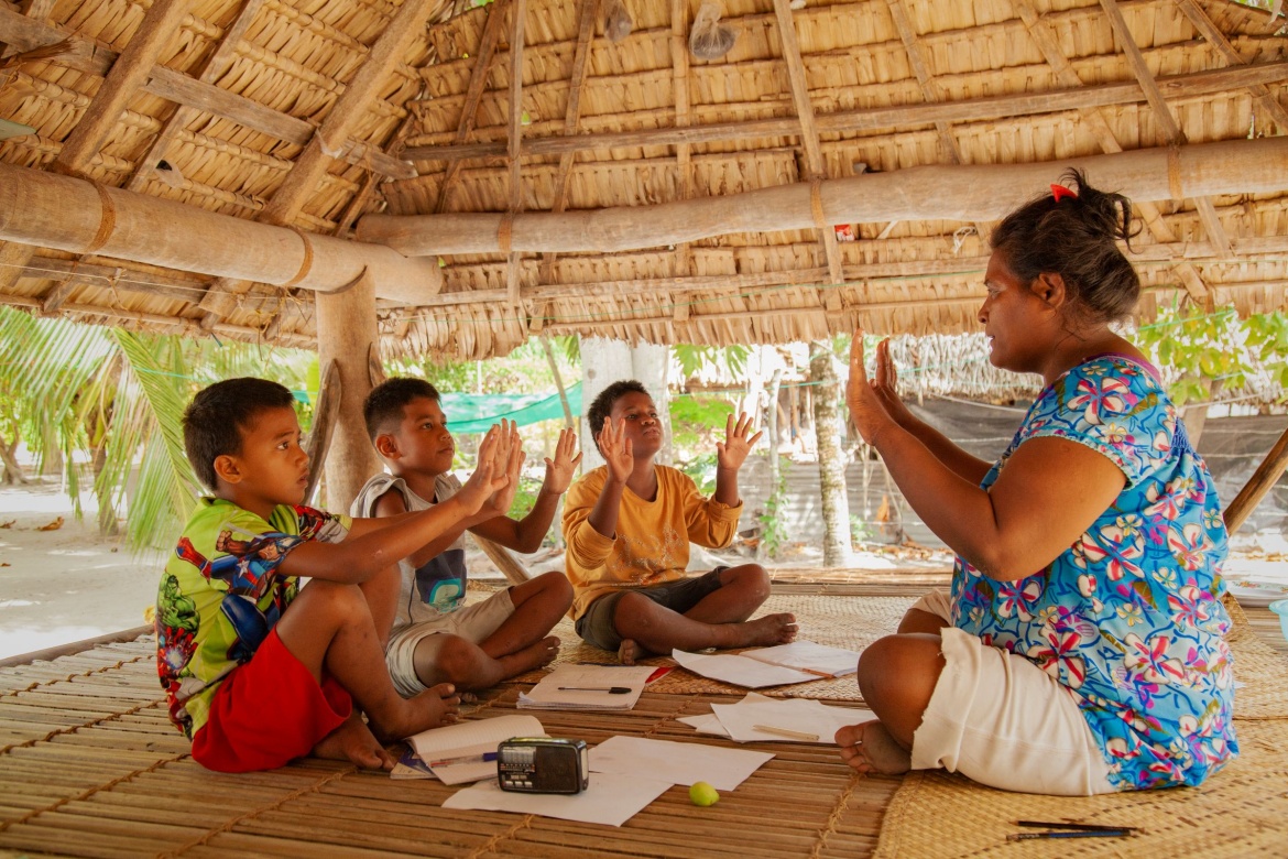 Children in Kiribati during remote learning through Radio lessons. Credit: UNICEF/UN0771689/Rice Chudeau